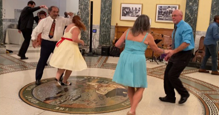 Two couples dancing