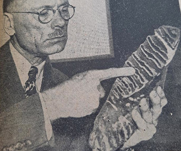 Dr. Frank Stanger with a woolly mammoth tooth