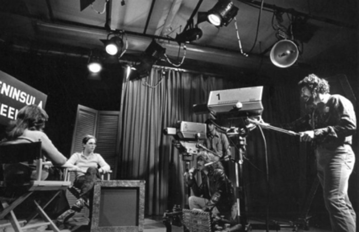 From left, instructor Linda Gianachini, Linda Rae, Bart Giovinetti (crouching) and Dave Ratto tape ‘Peninsula Weekly,’ a 1980s KCSM-TV student production.
