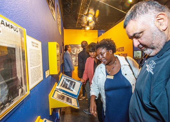 Attendees view the many College of San Mateo artifacts on display